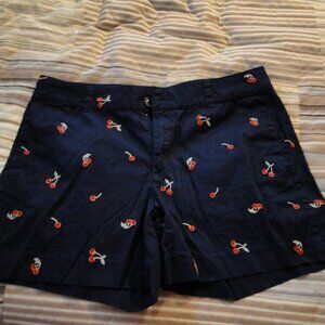 WOMENS SIZE 12 SHORT, ST JOHNS BAY NAVY SHORTS WITH CHERRIES, VERY GOOD SHAPE
